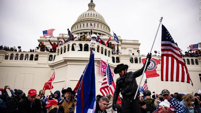 Decoding the extremist symbols and groups at the Capitol Hill insurrection  - CNN