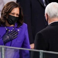 Trump's vice president Pence applauds successor at inauguration