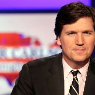 Tucker Carlson Rallies to Defense of QAnon Conspiracy Theorists