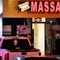 Georgia massage parlor shootings leave 8 dead; man captured