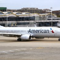 Woman Accused of Punching American Airlines Flight Attendant Over Garbage Is Given Travel Curbs