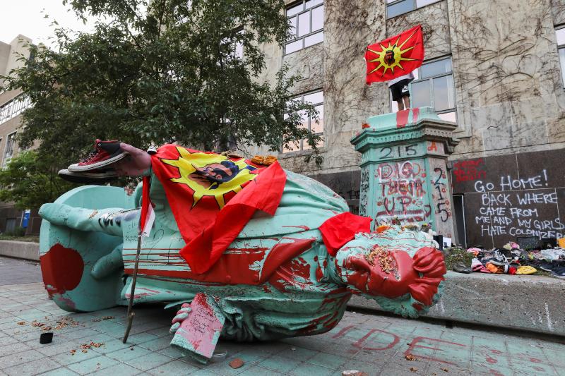 Statue of Canada residential schools architect toppled in Toronto