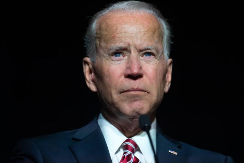 Biden tries to address rising crime and voting laws