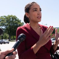 AOC vows progressives will 'tank' the bipartisan infrastructure bill if a reconciliation bill including more care-economy and climate change measures isn't passed in tandem