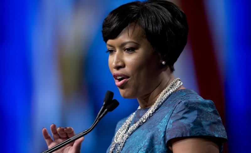 DC Mayor Bowser officiates maskless indoor wedding after reinstated mask mandate