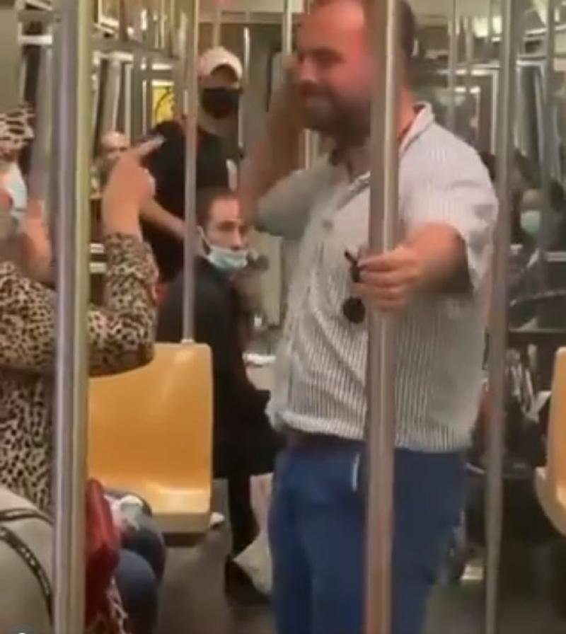 Trumpster F***head harasses old woman on New York City subway