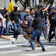 Anti-Vaxxer Videotaped Attacking Journalist At Los Angeles Protest Is Linked To Capitol Riot