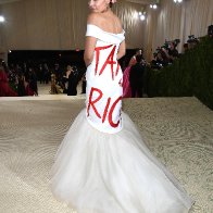 Alexandria Ocasio-Cortez's Dress at Met Gala 2021 Says 'Tax the Rich' | PEOPLE.com