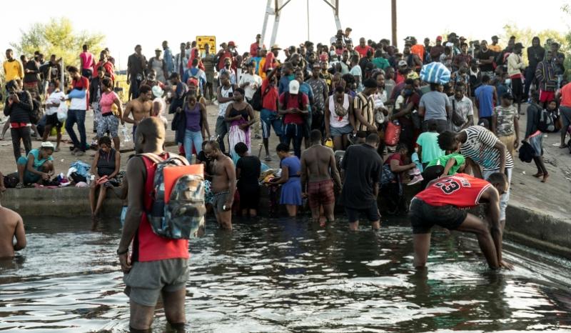 Mass of Migrants Crosses Rio Grande to Enter U.S. Illegally as Border Crisis Worsens