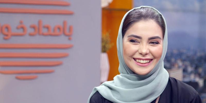 Afghan TV host smiles at the camera even through fear