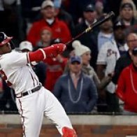 Back-to-back HRs put Braves on cusp of title