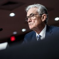 Dow closes with 650-point loss after Fed Chair Powell says he wants to speed up 'tapering'