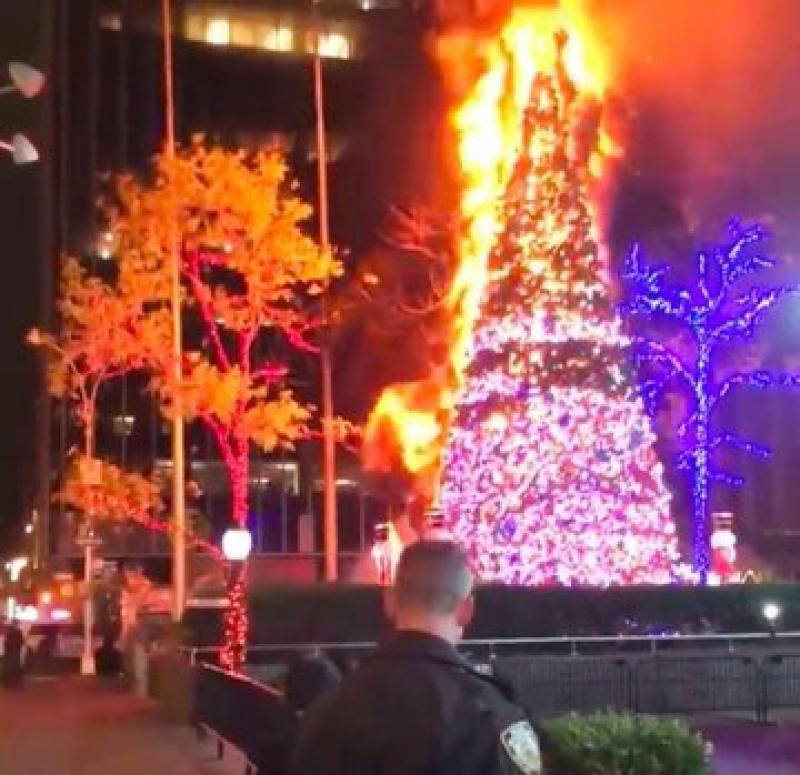 One arrest after Christmas tree set on fire outside News Corp. building in NYC