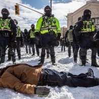 Ottawa Protestor Trampled to death by Officers Standing at Attention.