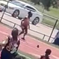 Moment girl loses her shoe in starting block, goes back to put it on, before WINNING 200-meter race 