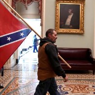 Man who carried Confederate flag in US Capitol and son found guilty of felonies - CNNPolitics