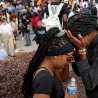 Three dead, including gunman, after shooting at St. Louis high school, officials say