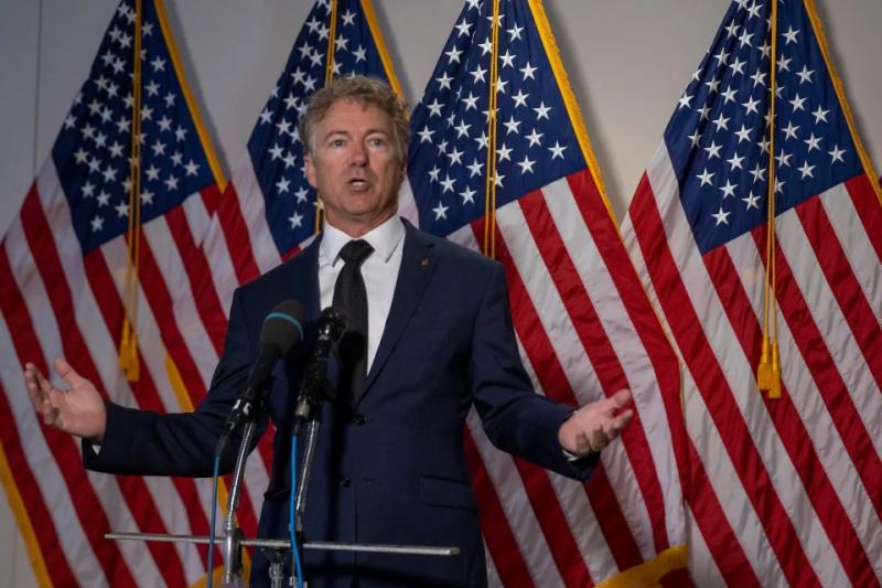 Rand Paul calls for disqualification of a Democratic Senate candidate over past jokes about the Kentucky Republican's broken rib from a violent neighbor