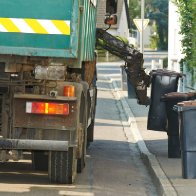 Toddler more excited to see garbage truck than own father