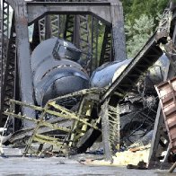 Train carrying hazardous materials derails and bridge collapses into Montana river