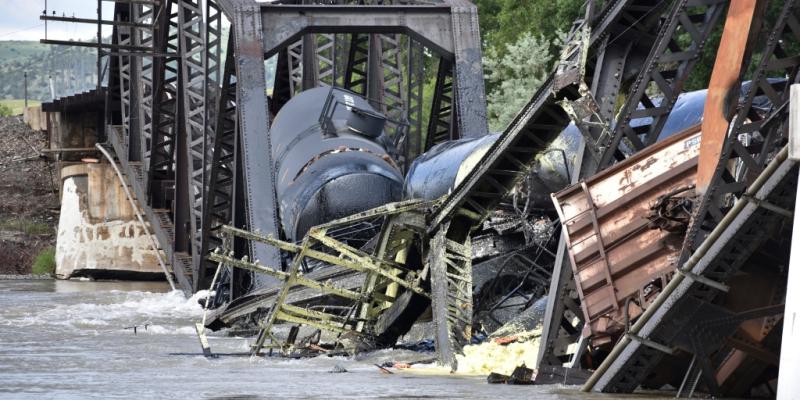 Train carrying hazardous materials derails and bridge collapses into Montana river