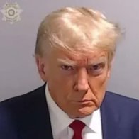 The Snap and the Scowl: The Trump Mugshot Ignites a Tinderbox Nation