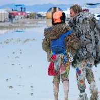 Death at Burning Man investigated as rain-soaked festival asks attendees to shelter in place