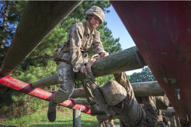 The Marines are moving gradually and sometimes reluctantly to integrate women and men in boot camp | AP News