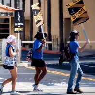 SAG-AFTRA and Hollywood studios reach a tentative agreement to resolve the strike