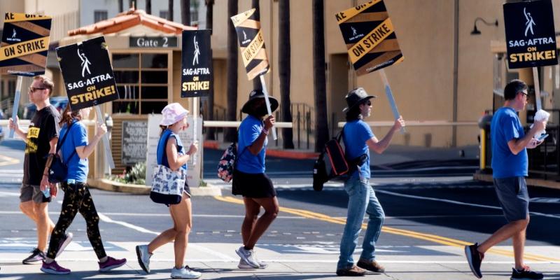 SAG-AFTRA and Hollywood studios reach a tentative agreement to resolve the strike