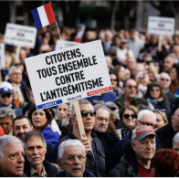 French politicians join 100,000 at Paris march against antisemitism | France | The Guardian