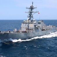 Missiles were fired toward a US Navy destroyer responding to an attempted hijacking near Yemen. The same warship was targeted in this area years ago.