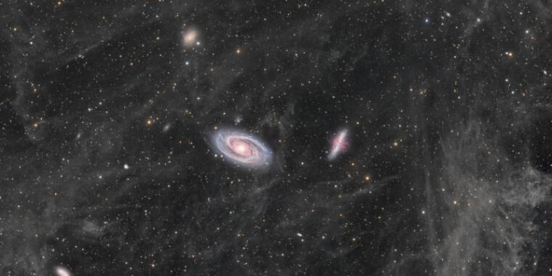 Daily Telescope: Two large galaxies swimming in a sea of interstellar dust | Ars Technica