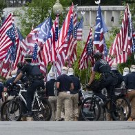 The upside-down American flag goes mainstream as a form of right-wing protest