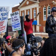 Several protesters break through security fence near United Center