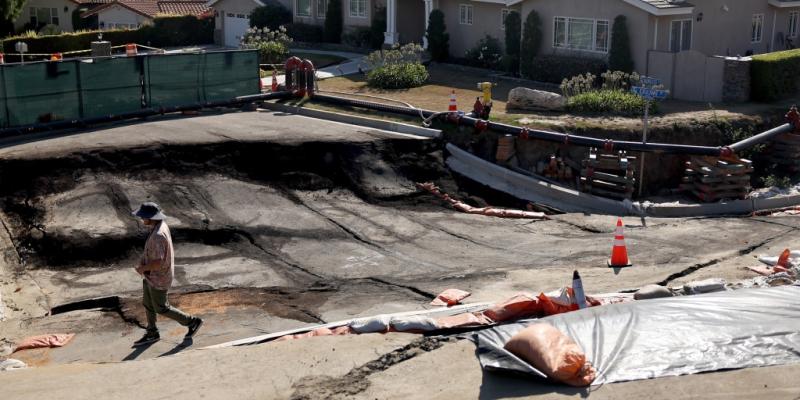 In California city hit by landslides, slipping may not be stoppable