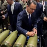 'Trump Will Start World War III,' Says Party Autographing Bombs To Be Launched At Russia