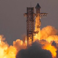 SpaceX catches Starship rocket booster in dramatic landing during fifth flight test