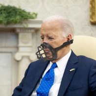 Biden Fitted With Muzzle So He Can't Bite Any More Babies