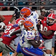 Jacksonville deputies under review after videos of violent fracas with fans at Florida-Georgia football game go viral