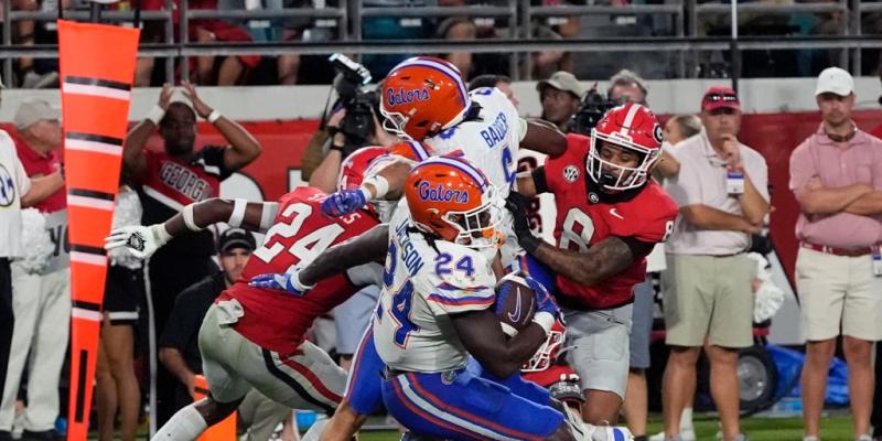 Jacksonville deputies under review after videos of violent fracas with fans at Florida-Georgia football game go viral