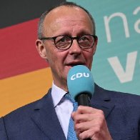 Conservatives win German election while far-right party surges to second place