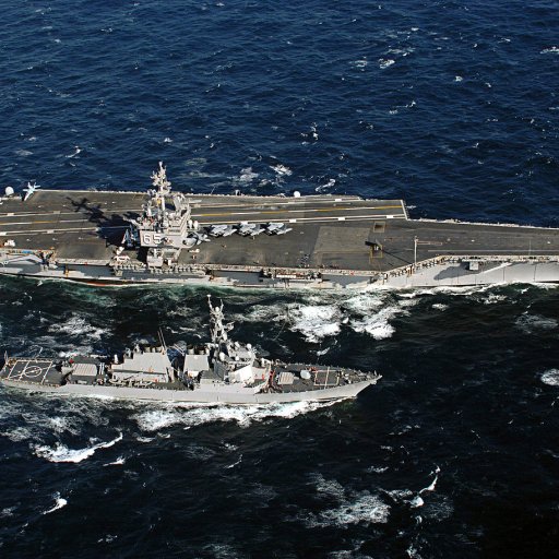 USS Enterprise refuling a Burk class destroyer