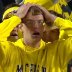 2D83FCD000000578-3282196-The_face_that_says_it_all_This_Michigan_fan_looked_horrified_as_-a-4_1445398510133