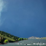 Boats evacuating Horsetooth Resevoir