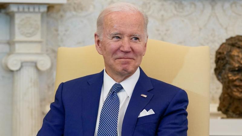 On key issues, a struggling Biden embraces Trump