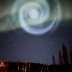 Odd spiral appears amid northern lights in Alaska night sky