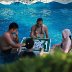 Chongqing residents play mahjong in water to cool off