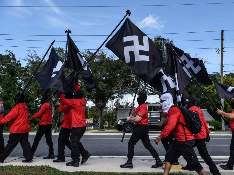 Neo-Nazis parade swastika flags in Florida, chanting 'We are everywhere'