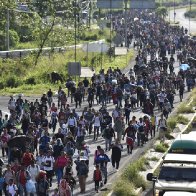 Some 5,000 migrants set out on foot from Mexico's southern border, tired of long waits for visas | AP News